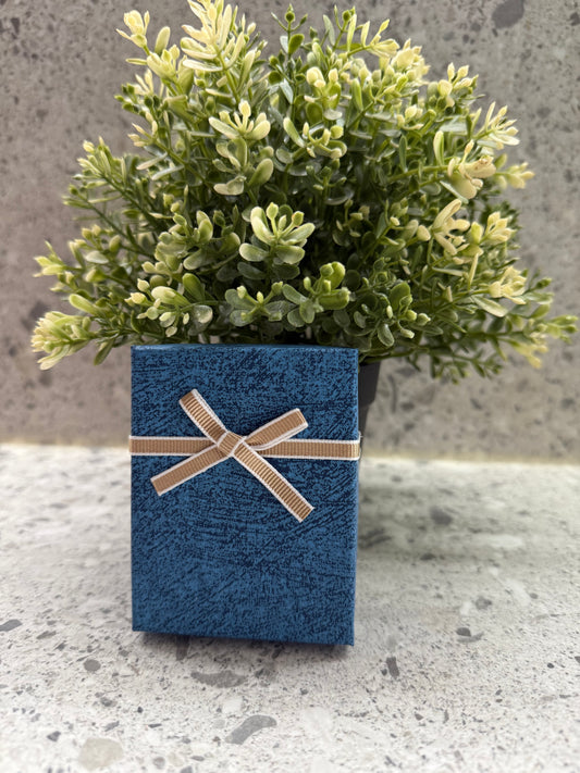 Dárkové krabičky s hnědými mašlemi